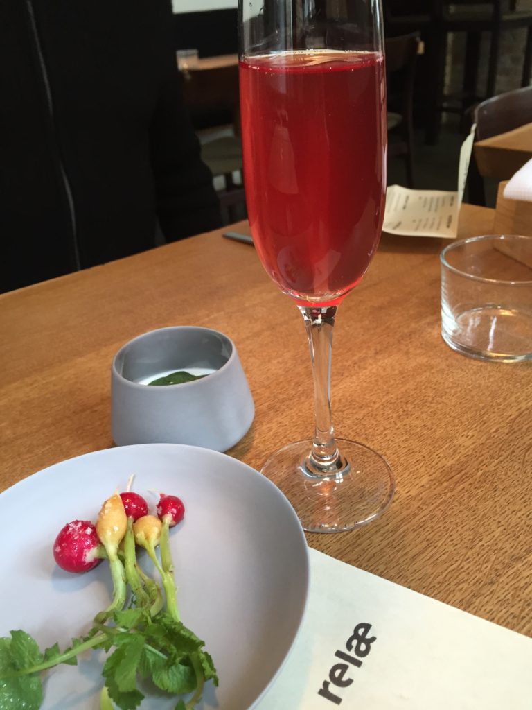 Baby radishes and an Italian rose