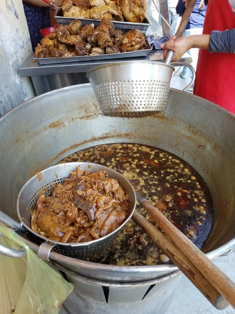 Carnita meat pulled and drained from the pork lard simmer in Santa Rosa Jaurengui.