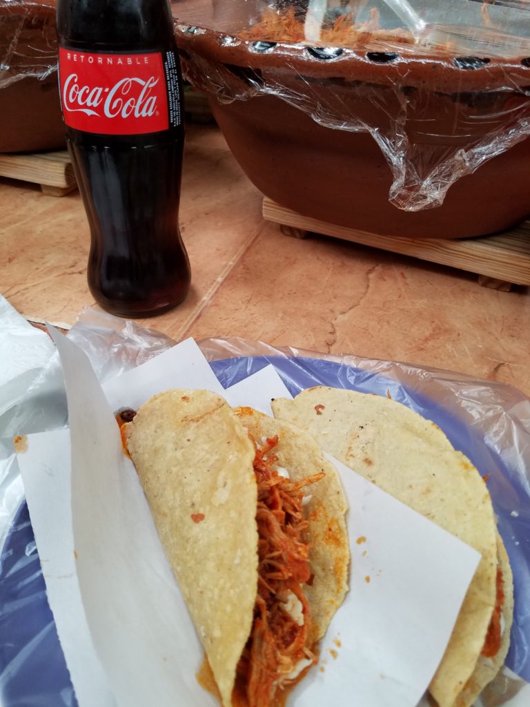 2 quesadillas with chicken tinga and a real bottle of Coca-cola at Mercado La Cruz