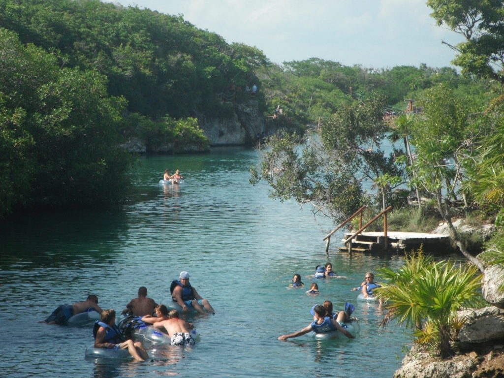 People floating through the lagoon at Xel-Ha, Mexico