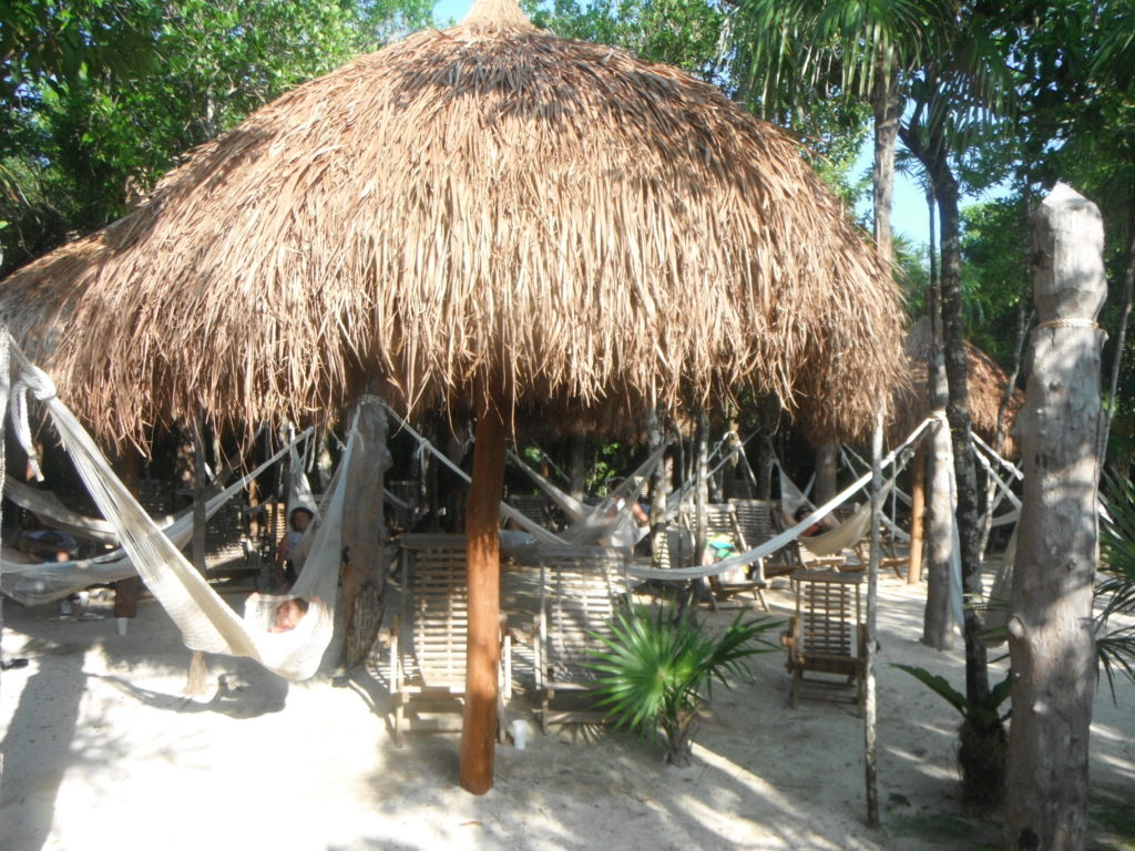Hammocks under a palapa at Xel-Ha, Mexico