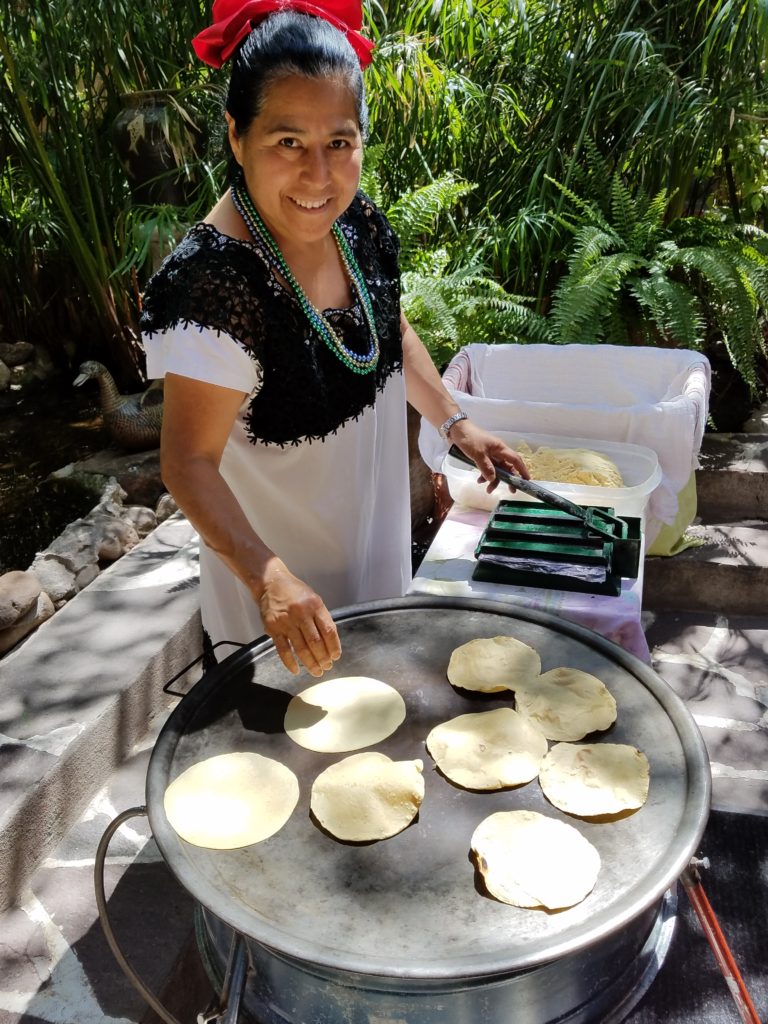 Woman making tortillas