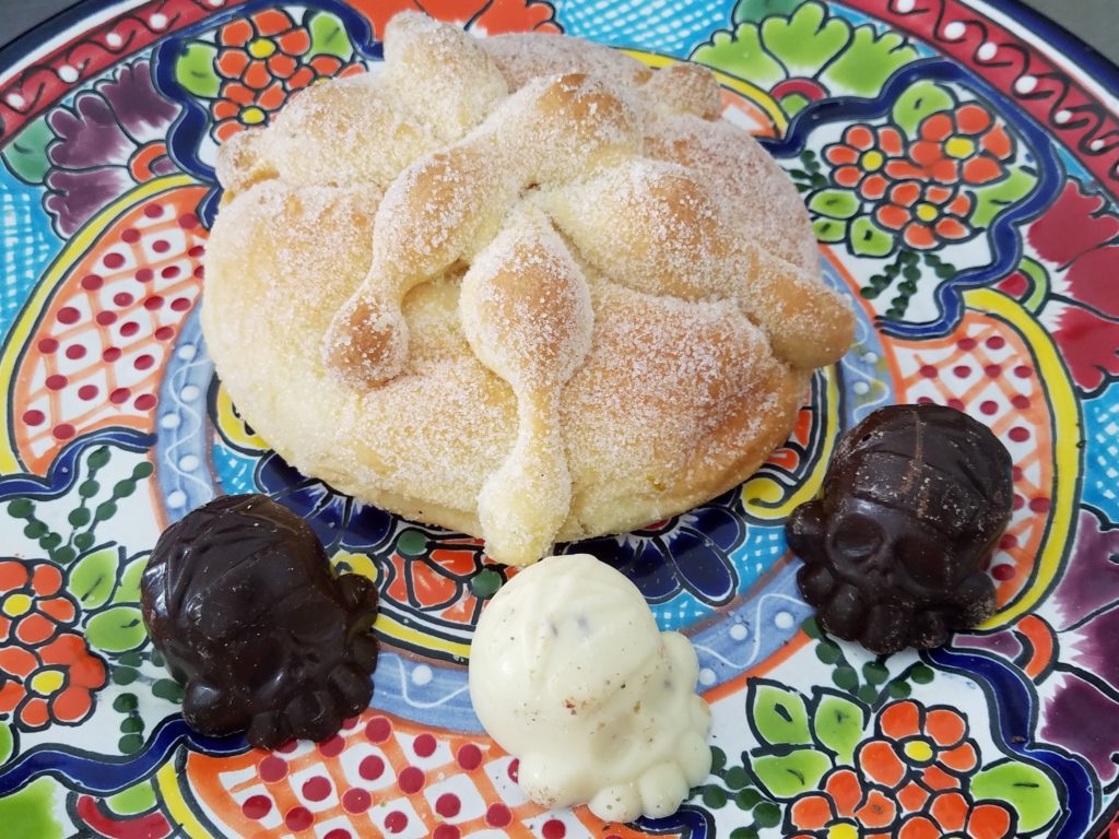 Pan de Muerto with chocolate skulls Pan de Muerto with chocolate skulls