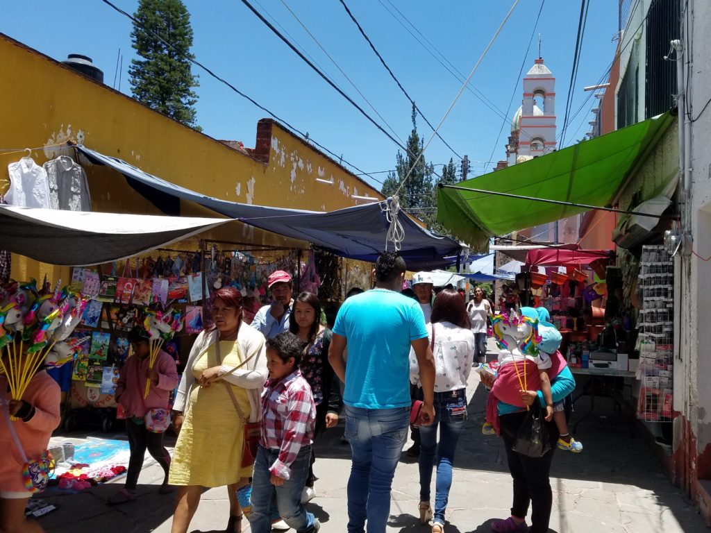 Walking Street with shops and vendors in Santa Rosa Jauregui