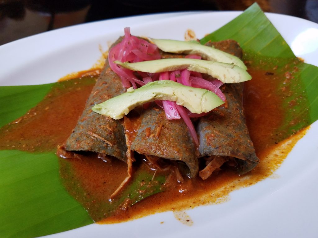 Tacos conchinita pibil at Tikua Sureste Tacos conchinita pibil at Tikua Sureste