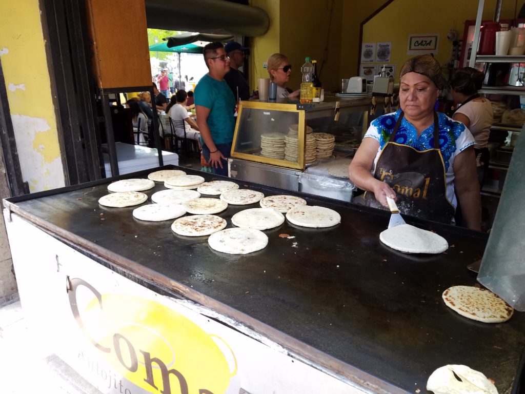 Ladies cooking gorditas at El Comal Antojitos Mexicanos