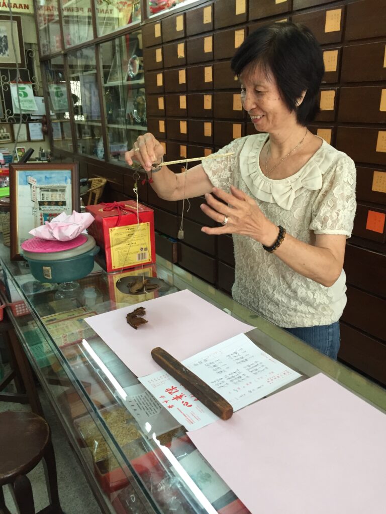 Chinese medicine woman in Penang