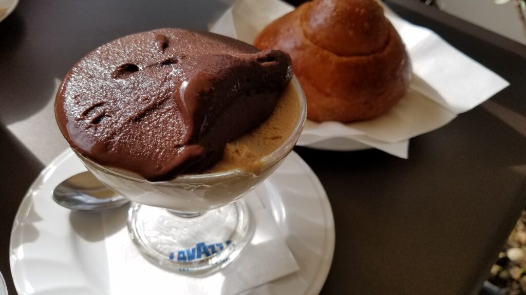 Chocolate and hazelnut granite served with brioche in Catania, Sicily