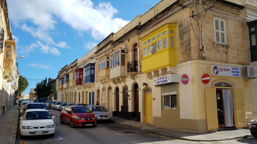 Colorful enclosed balconies in Malta