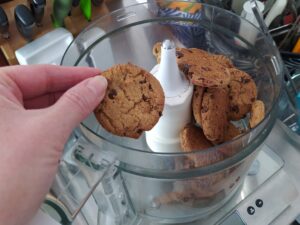 Chocolate chip cookies in a food processor to make cheesecake crust
