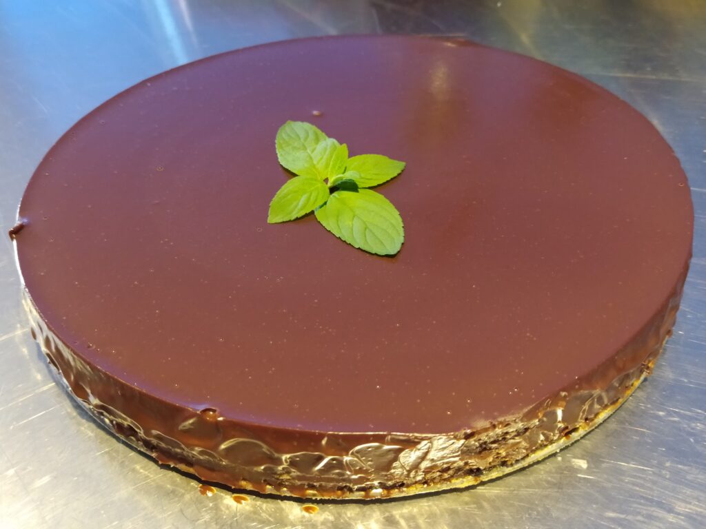 Cheesecake coveres witn mexican chocolate ganache
