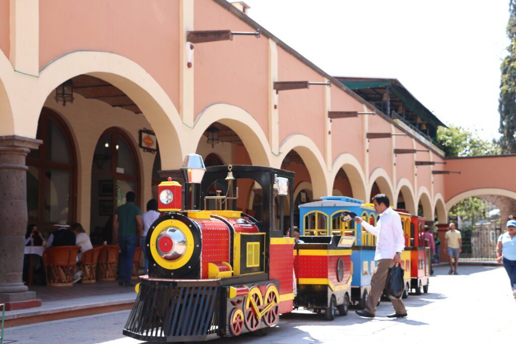 Chidren's train goes around Plaza Miguel Hidalgo, Tequisquiapan, Mexico