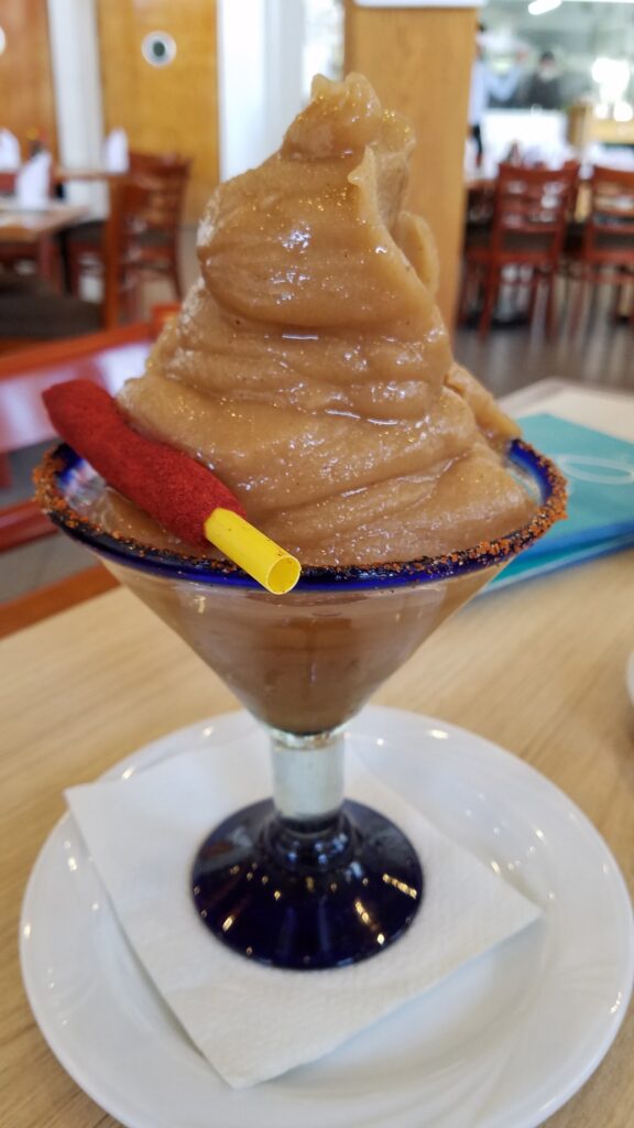 Frozen Tamarind Margarita with chamoy stick